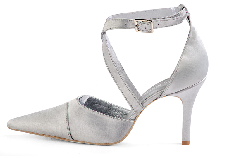 Light silver women's open side shoes, with crossed straps. Pointed toe. High slim heel. Profile view - Florence KOOIJMAN